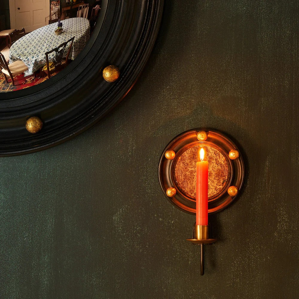 Perfect for a slightly gothic late night vibe: the Dracool wall mounted candle holder in ebony wood